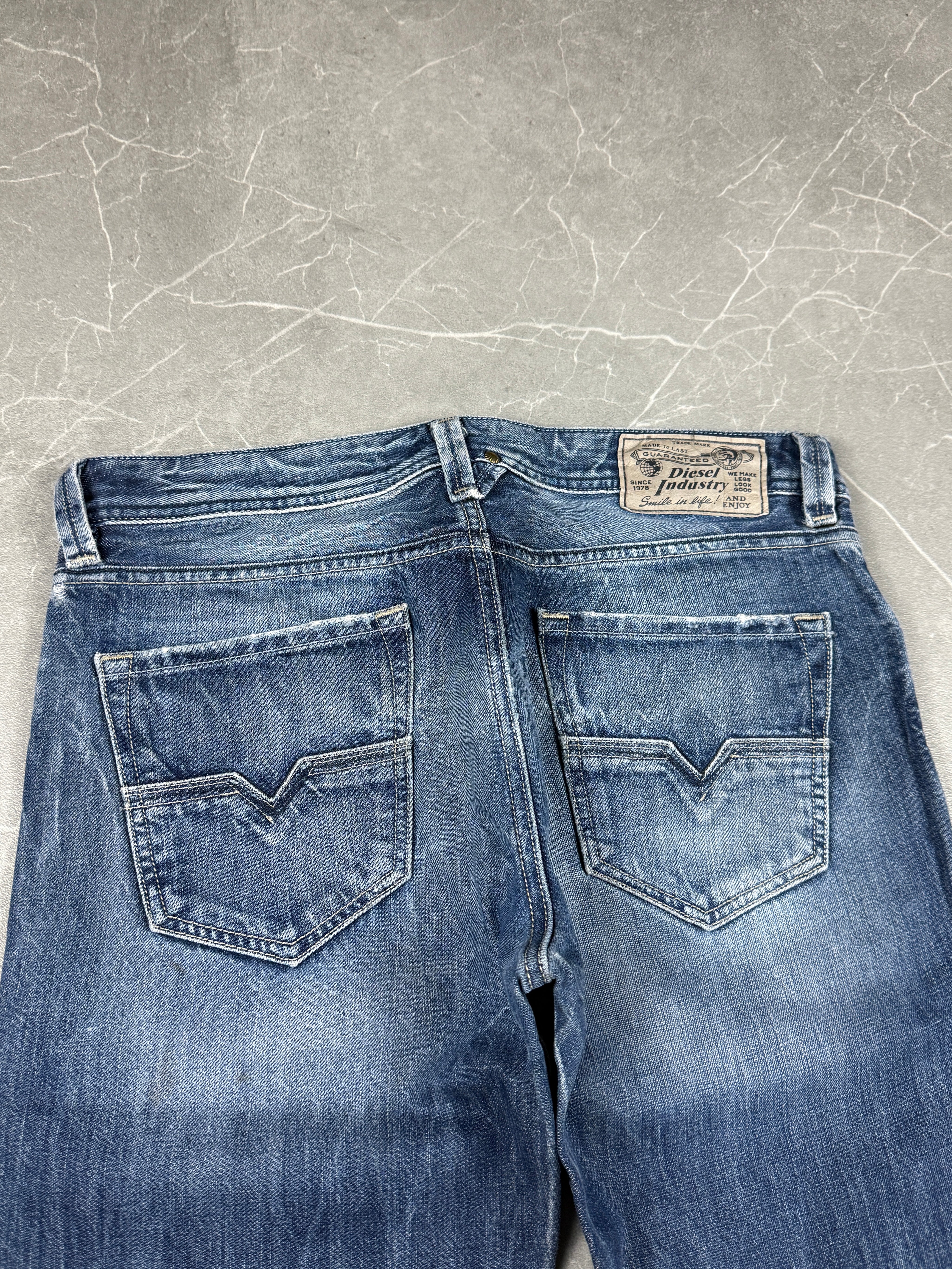 Diesel washed jeans (M)