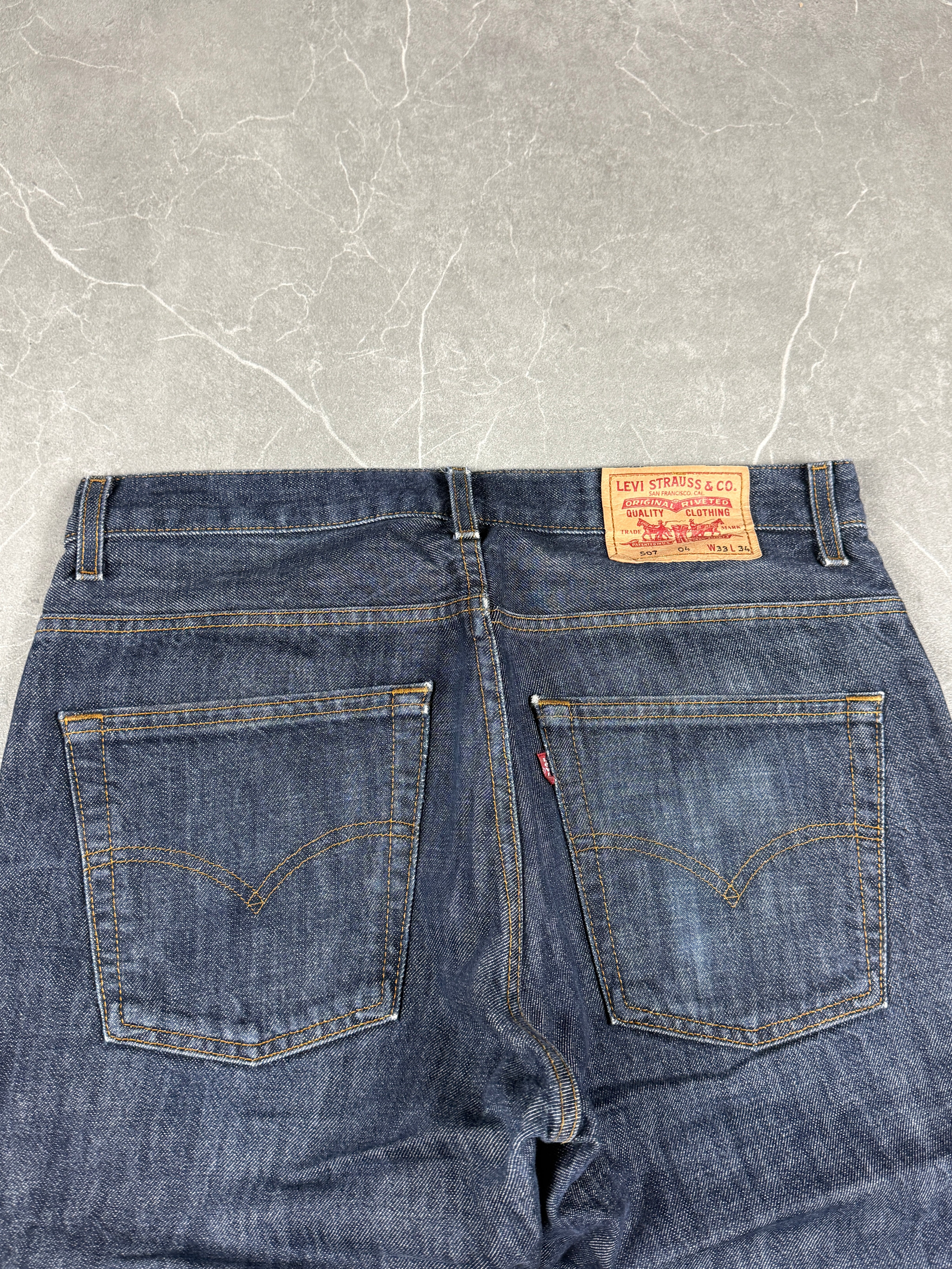 Levi's Raw Bootcut Denim (M)