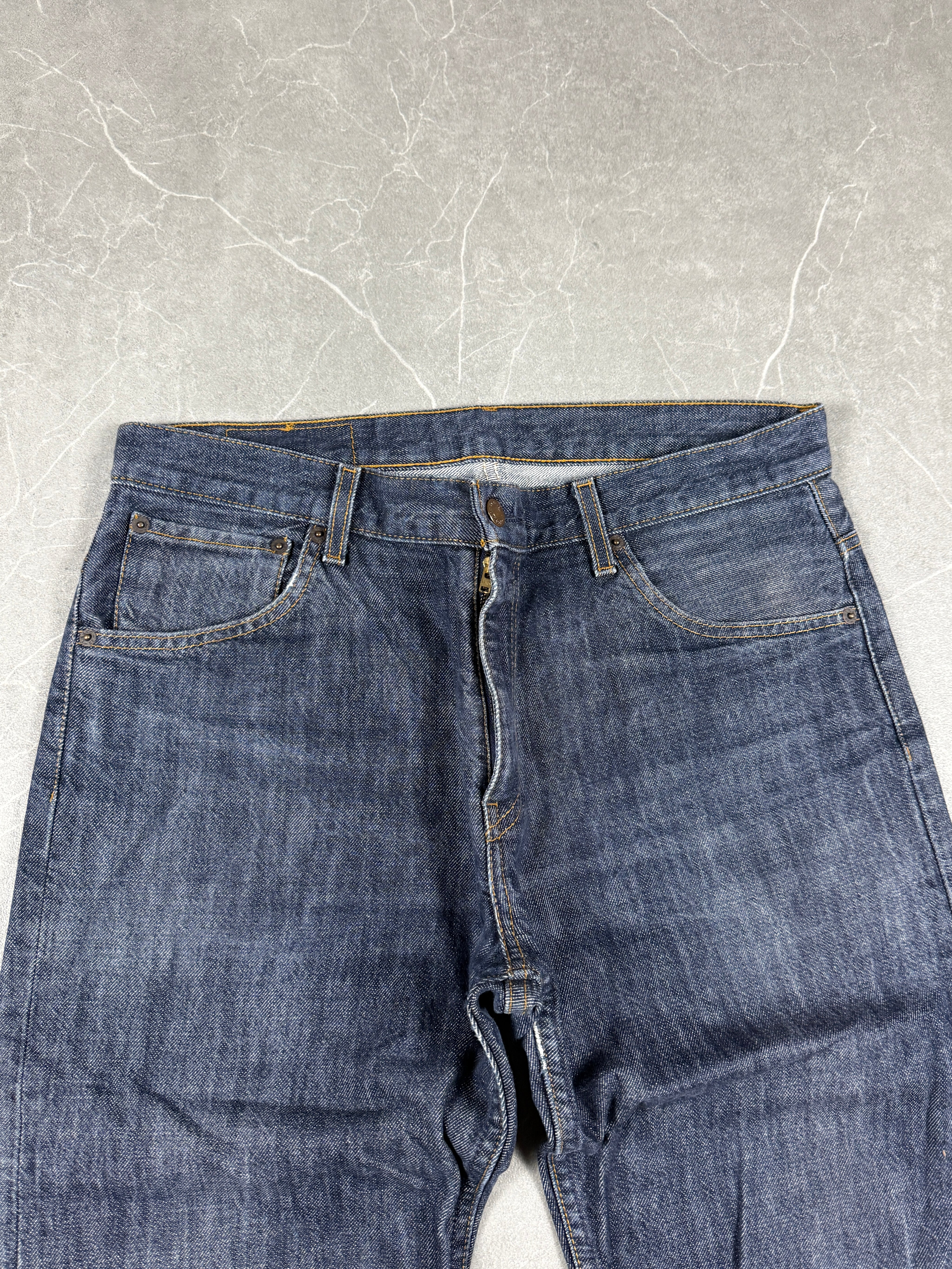 Levi's Raw Bootcut Denim (M)