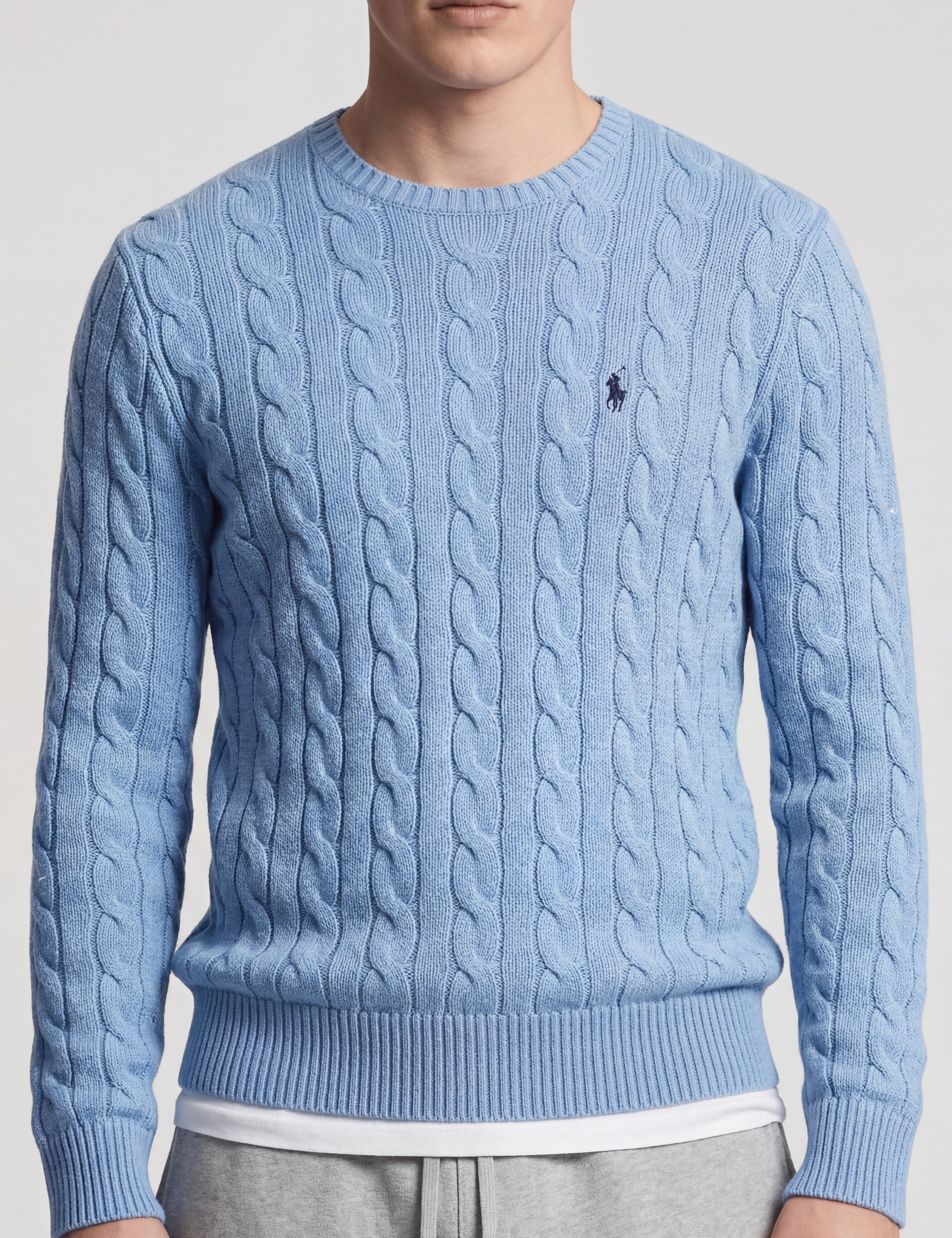Light blue Ralph Lauren cable knit sweater with crew neck and embroidered pony logo. Size L.