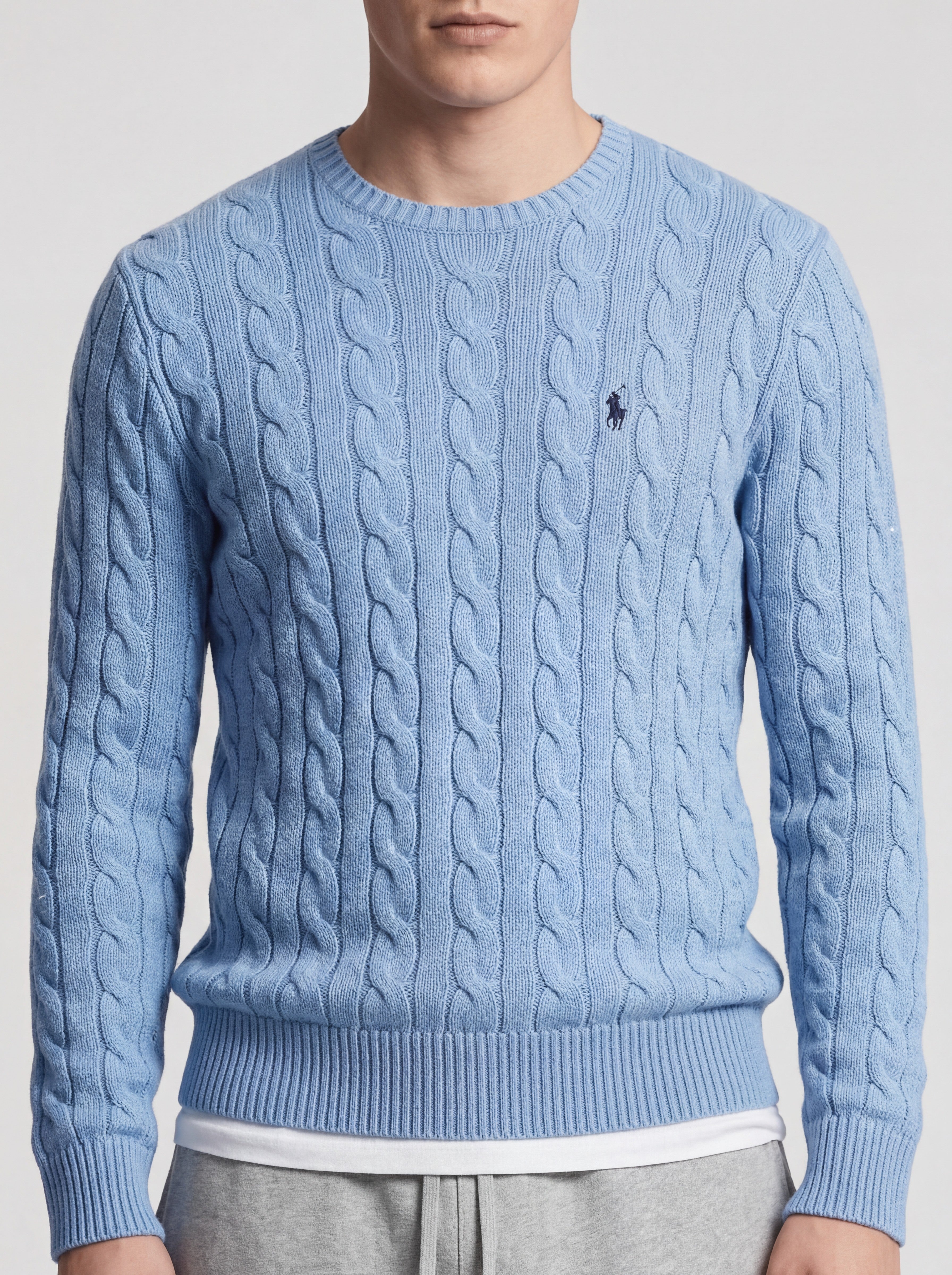 Light blue Ralph Lauren cable knit sweater with crew neck and embroidered pony logo. Size L.