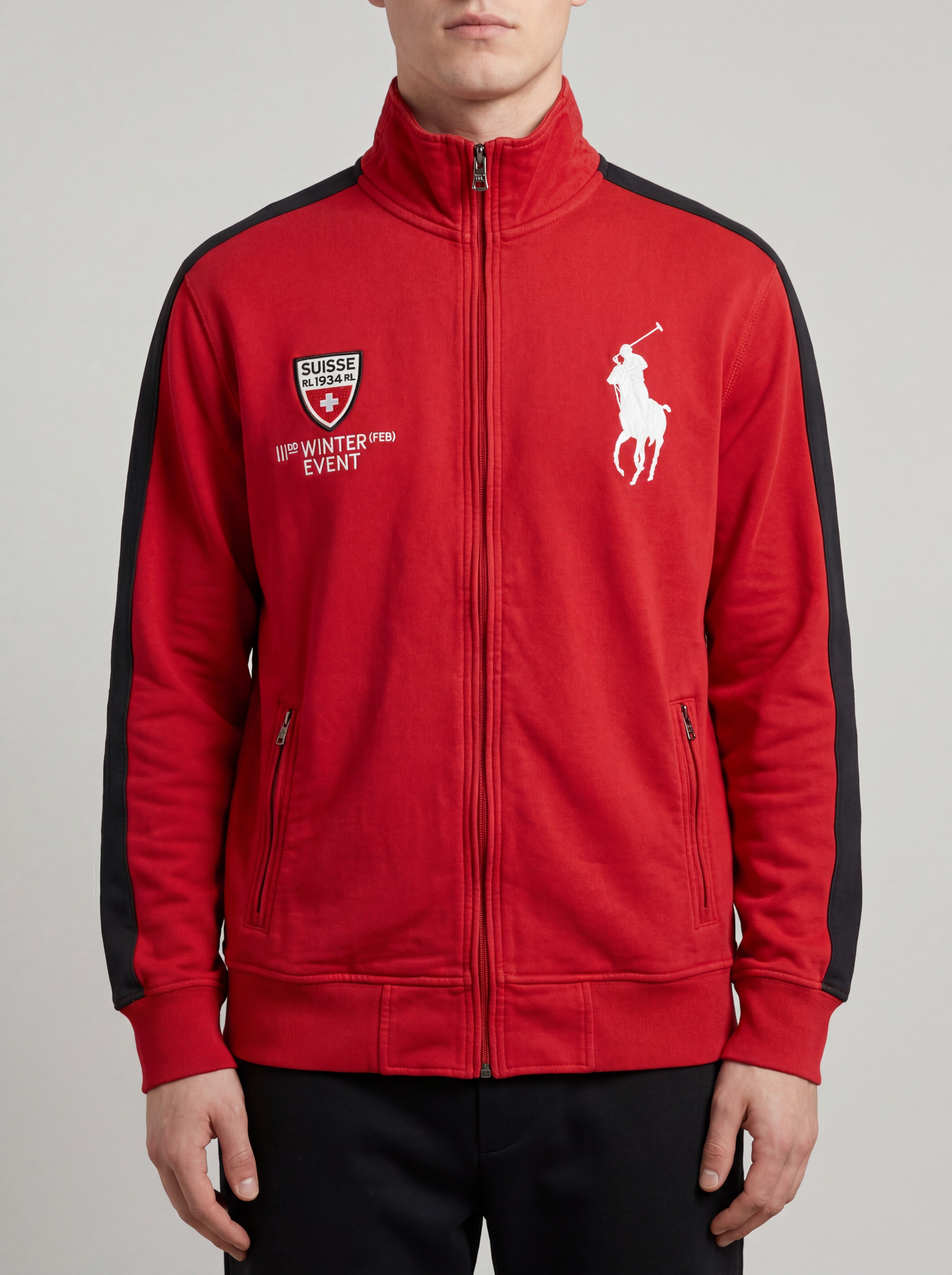 Red Ralph Lauren track jacket with black sleeves, white Big Pony logo, and Swiss event patch. Zipper closure, two zip pockets.