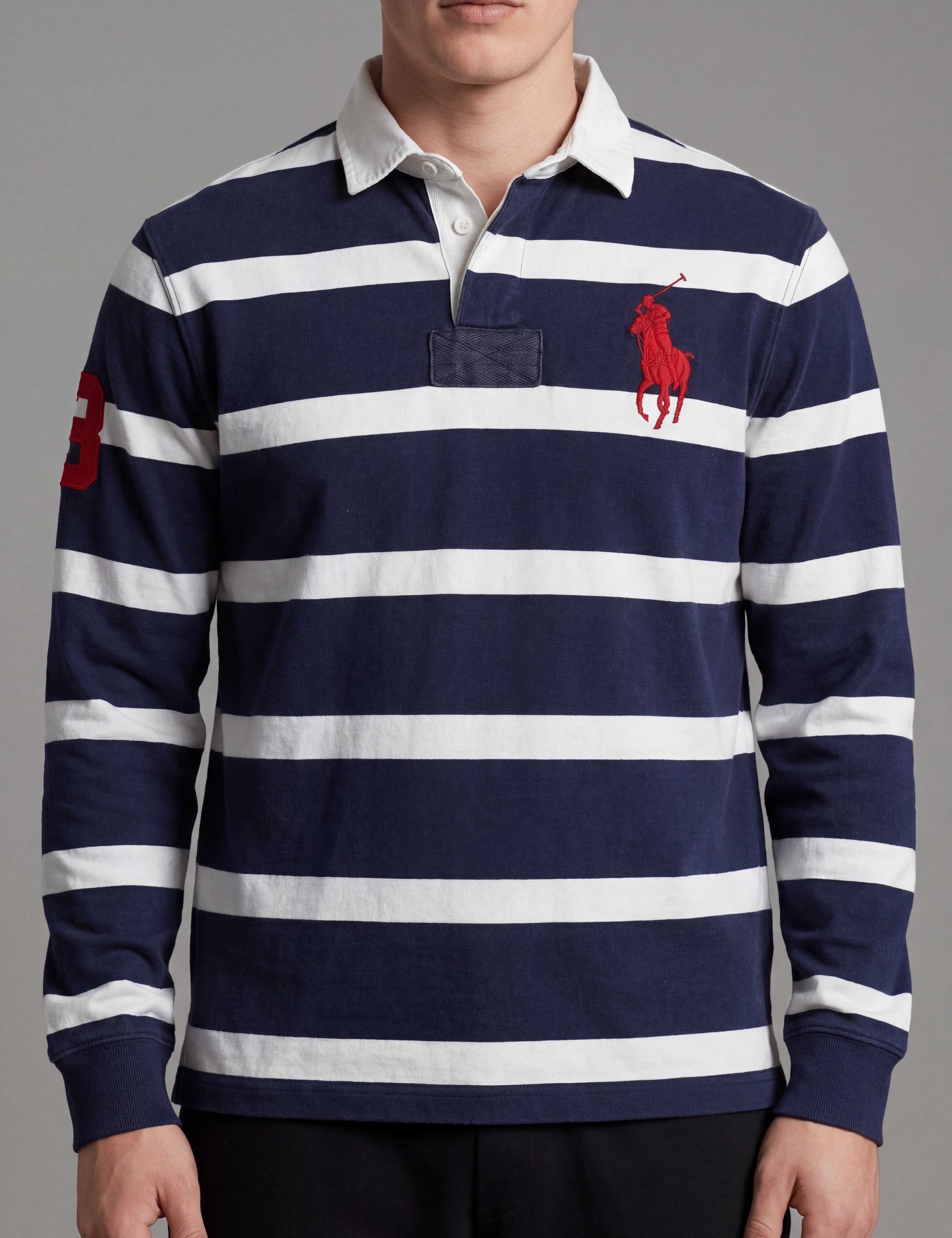 ninesixfits navy and white striped long sleeve rugby shirt with red embroidered polo player logo and '3' patch.