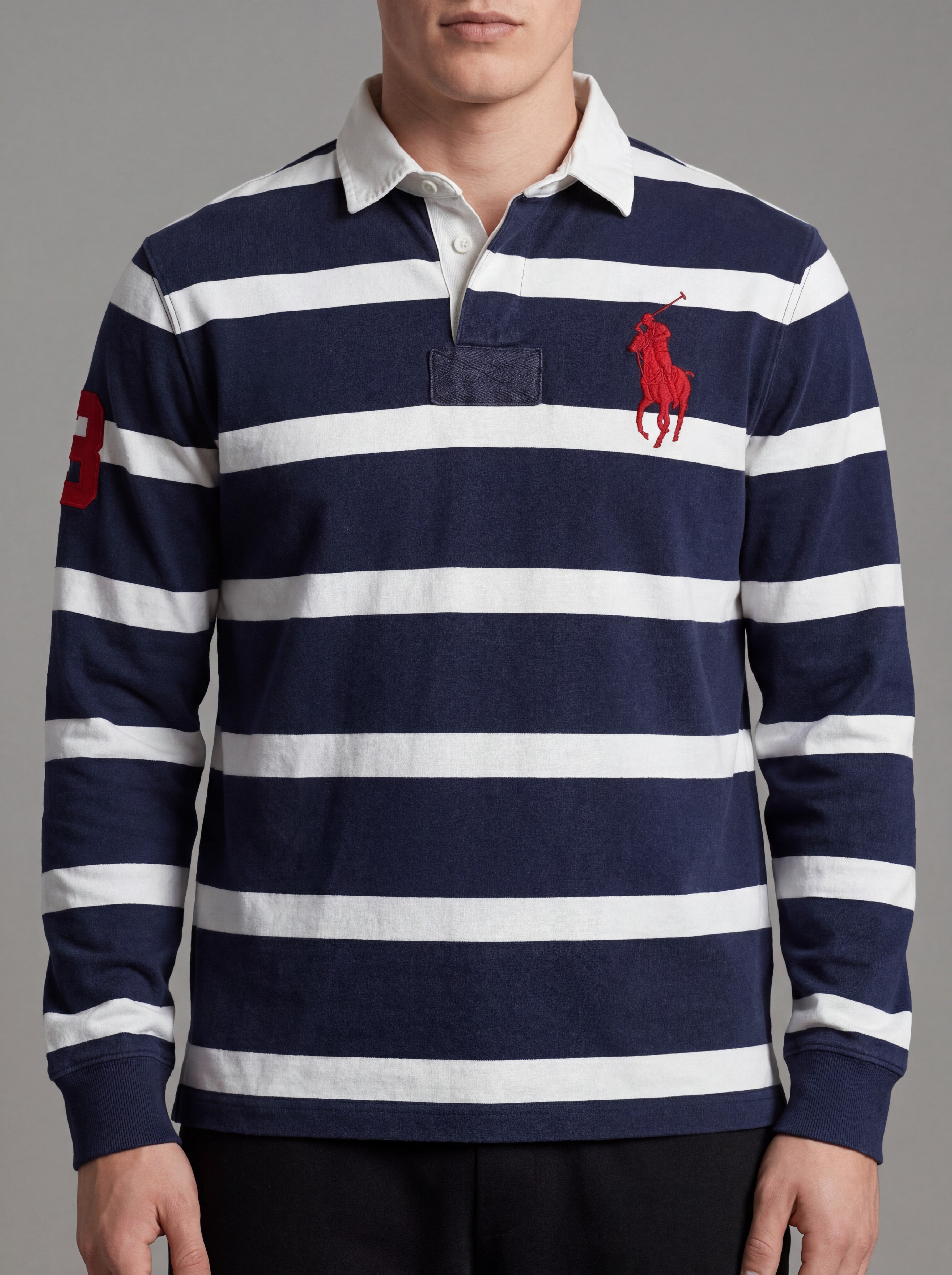 ninesixfits navy and white striped long sleeve rugby shirt with red embroidered polo player logo and '3' patch.