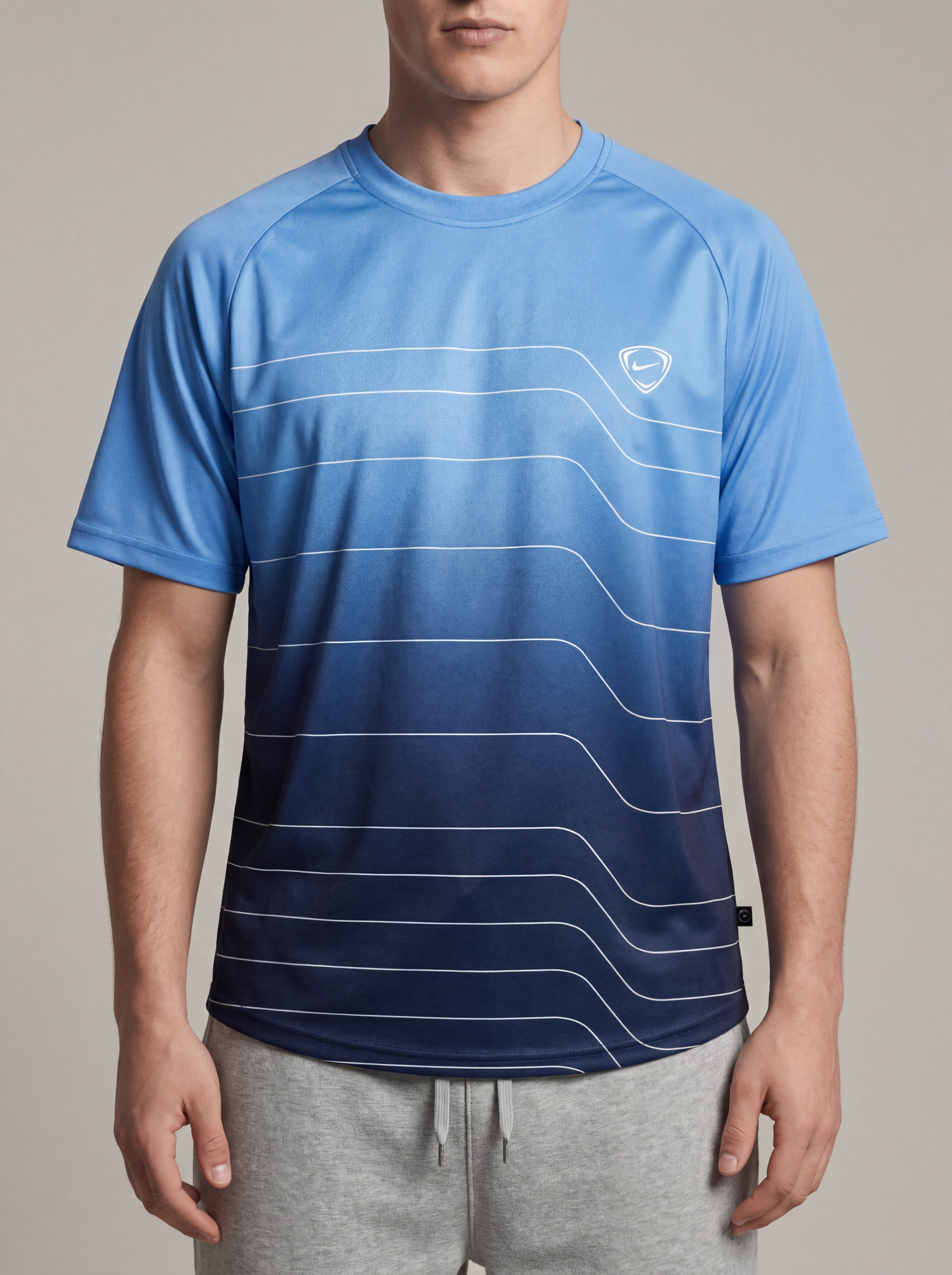 ninesixfits vintage Nike t-shirt in size L, featuring a blue gradient with white wavy lines and a small Nike logo.